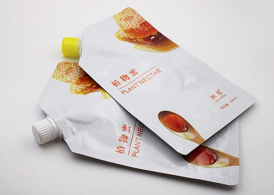 Le borse liquide di plastica del becco con versano il becco per l'imballaggio fresco della bevanda del succo