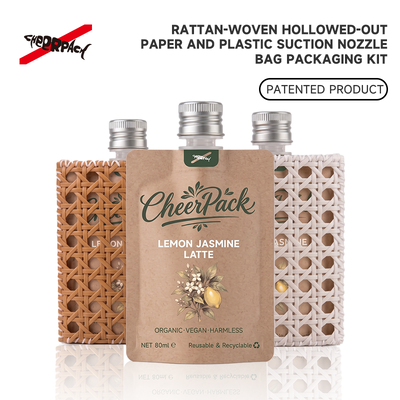 Qualità  Reusable Rattan Woven Spout Pouch with Aluminum Cap | CheerPack Patented 100ml rattan-woven hollow-out spout pouch with reusable Sleeve and aluminum screw cap. Eco cosmetic packaging, OEM/ODM welcome. Fabbrica