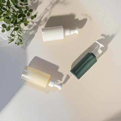 Flacone per pompa di lozione a forma di cilindro in PET da 300 ml-500 ml per confezioni cosmetiche con stampa logo personalizzabile