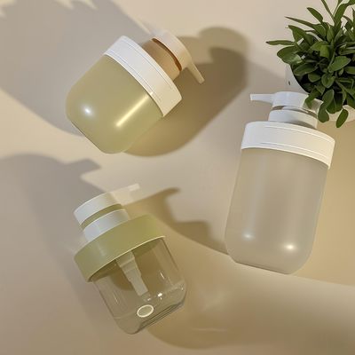 Bottiglia cosmetica in plastica PET da 300 a 500 ml con sigillatura della pompa e copertura della spalla per il lavaggio a mano e l' imballaggio per la bellezza