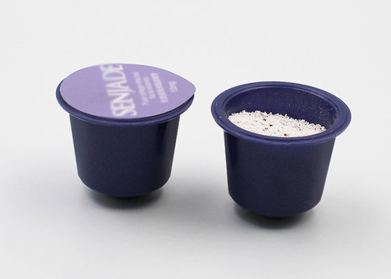 Le mini capsule del baccello del caffè per la polvere/bevanda condite latte di Nespresso spolverizzano le capsule dell'imballaggio con il film di sigillamento